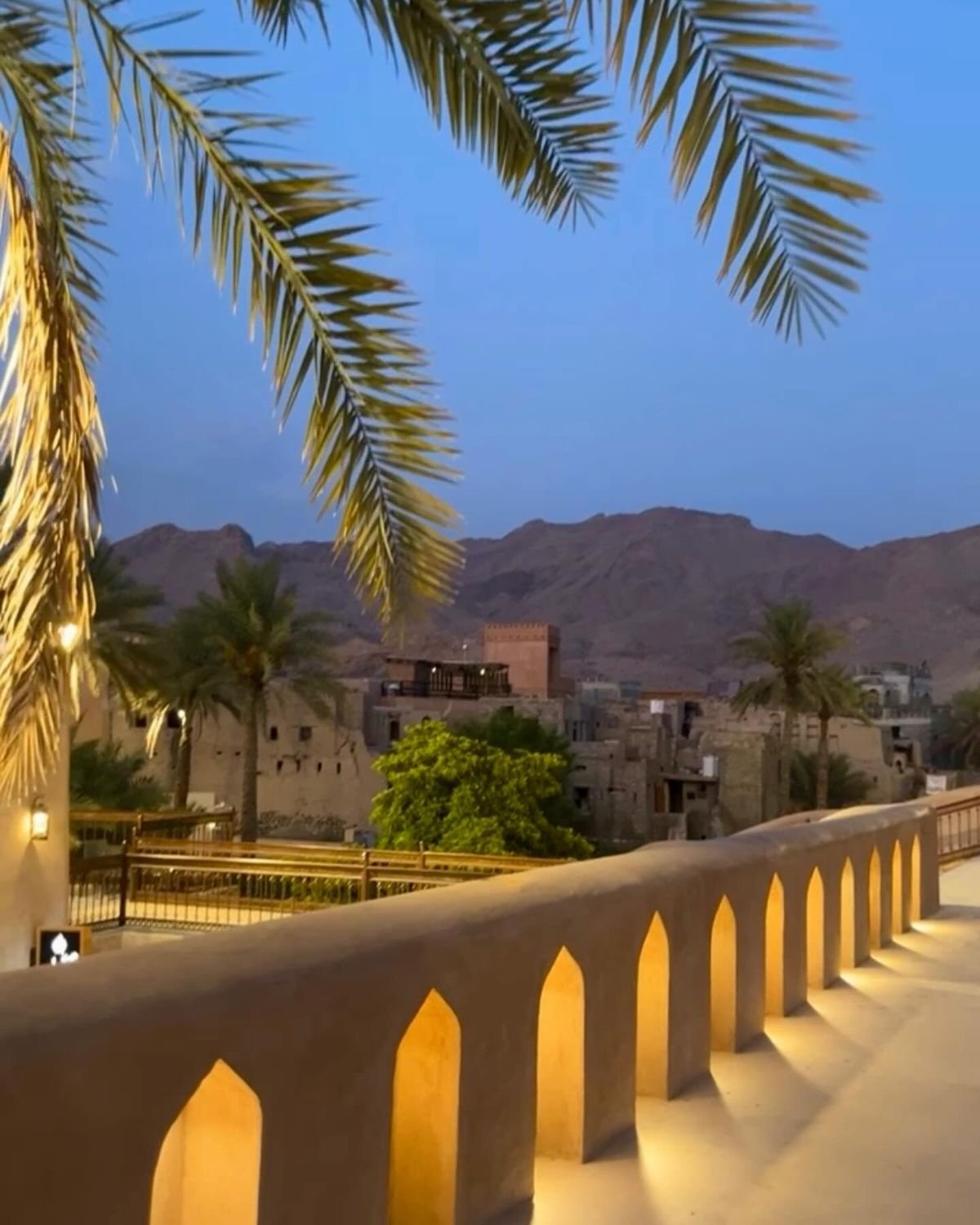 Narrow basalt-paved lane in old Madinah in soft morning light